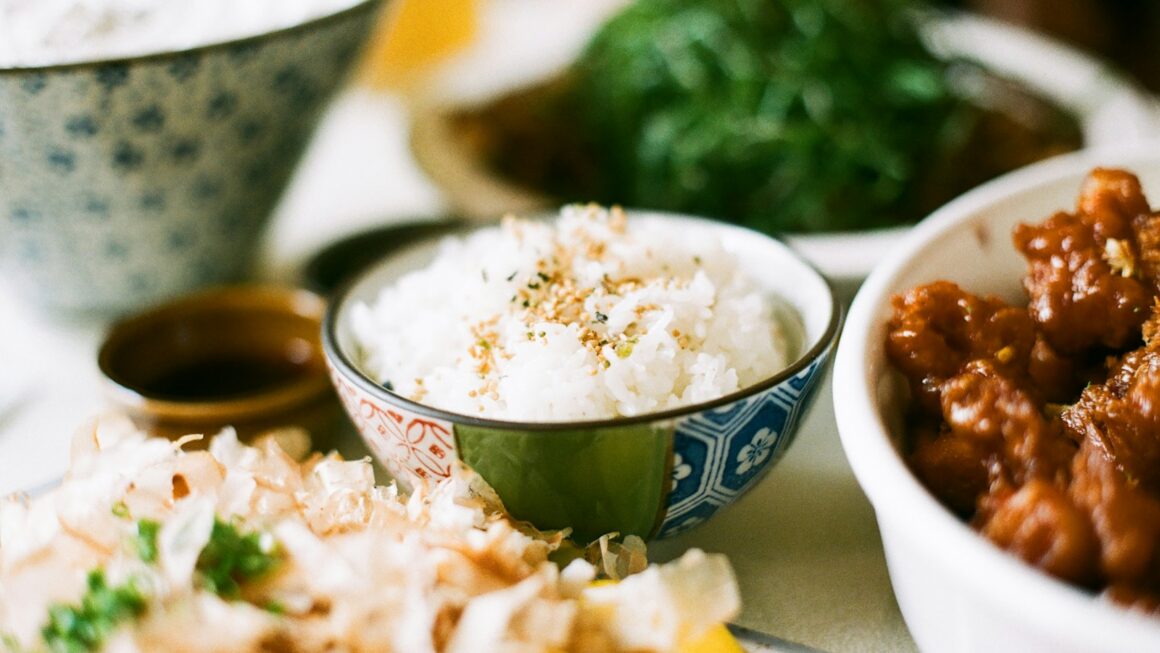 white and blue ceramic bowl with rice