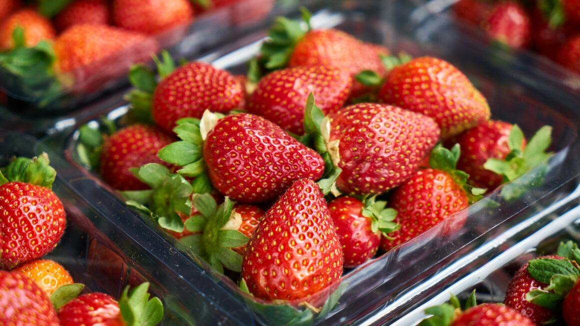 strawberries on clear plastic container